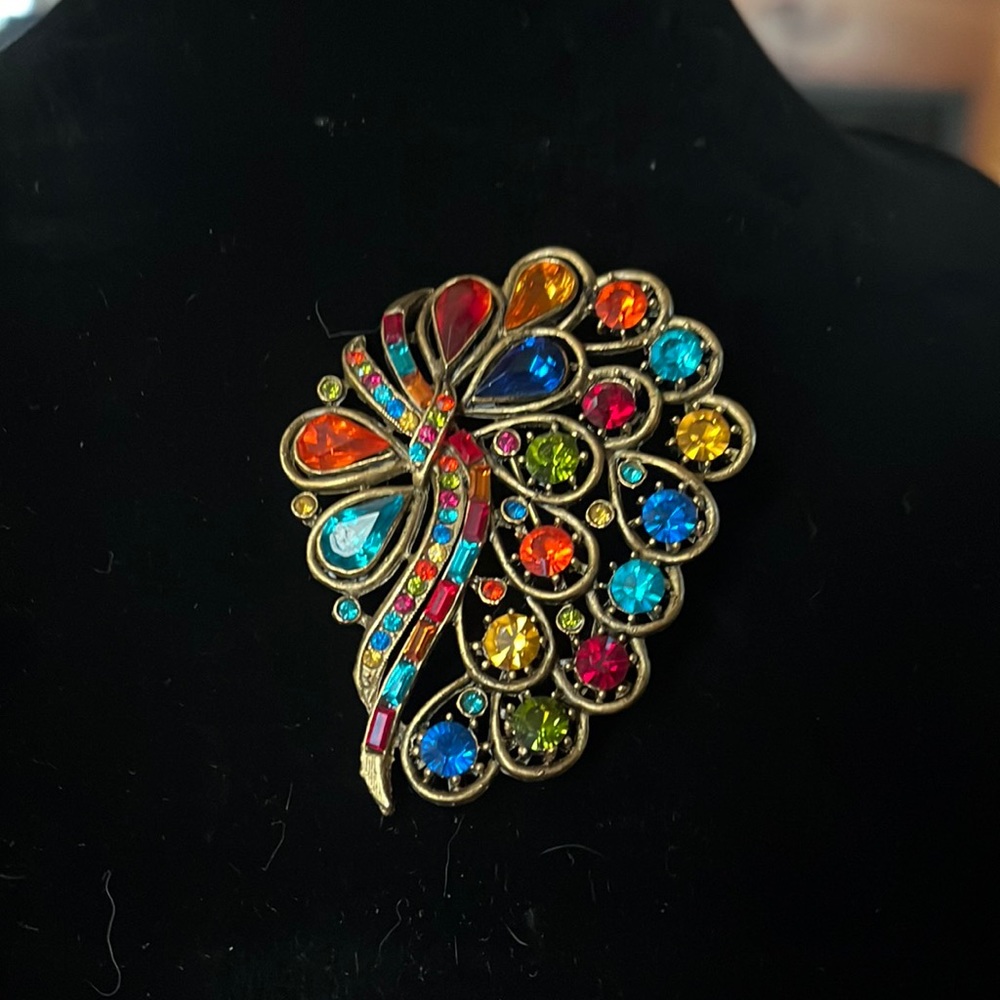 Goldstone brooch